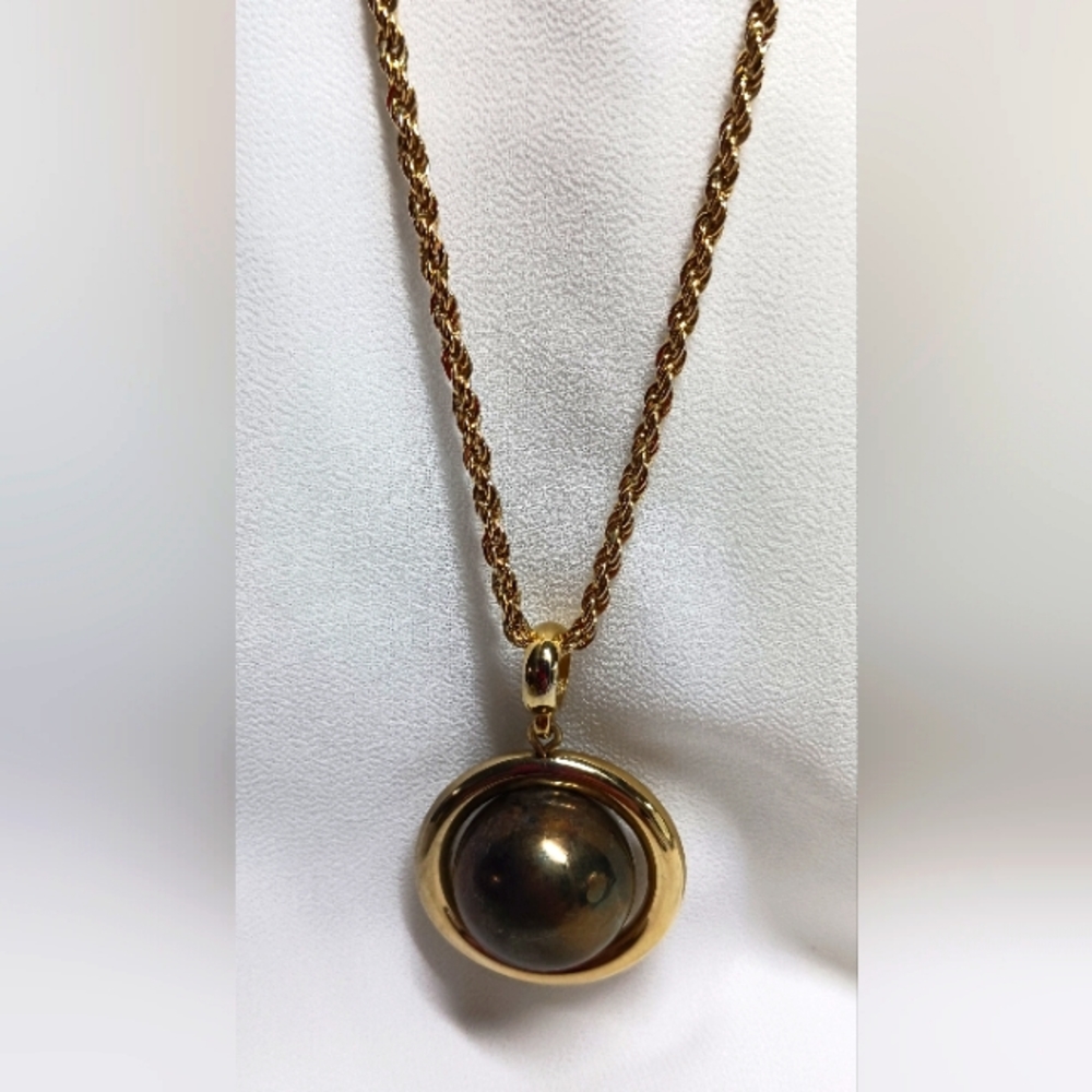 Gold tone necklace with faux pearl  pendant